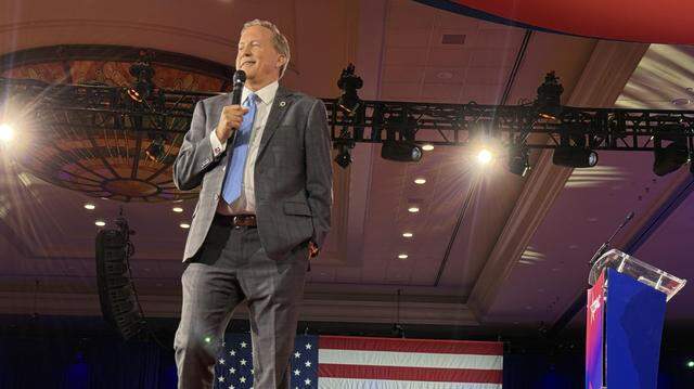 Texas Attorney General Ken Paxton speaks at CPAC on Saturday in Grapevine.